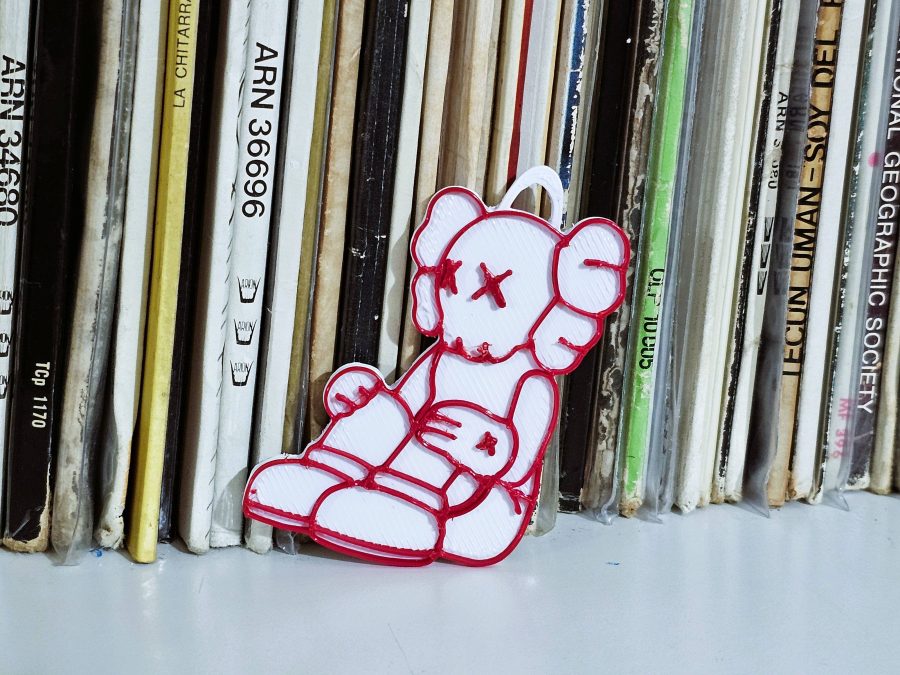 Kaws keychain + badge