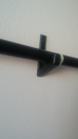 Benshpress dumbbell holder on wall