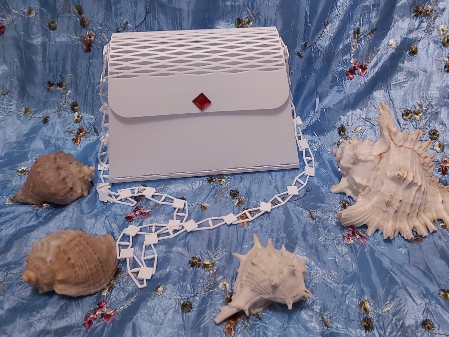 Small summer handbag with magnetic closure