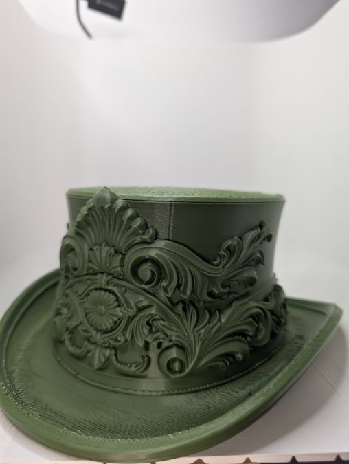 Verdemasque — The Hat That Refused a Single Purpose