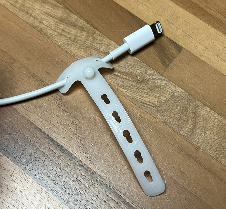 TPU cable organizer (stays on for everyday use)