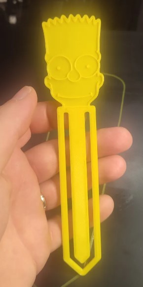 Marcador de páginas con cara de personaje The Simpsons