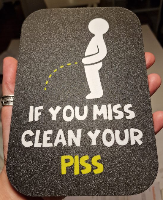 Funny WC sign - "Clean your piss"