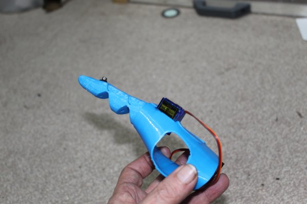 (WIP) Prosthetic index finger with servo assisted thumb .