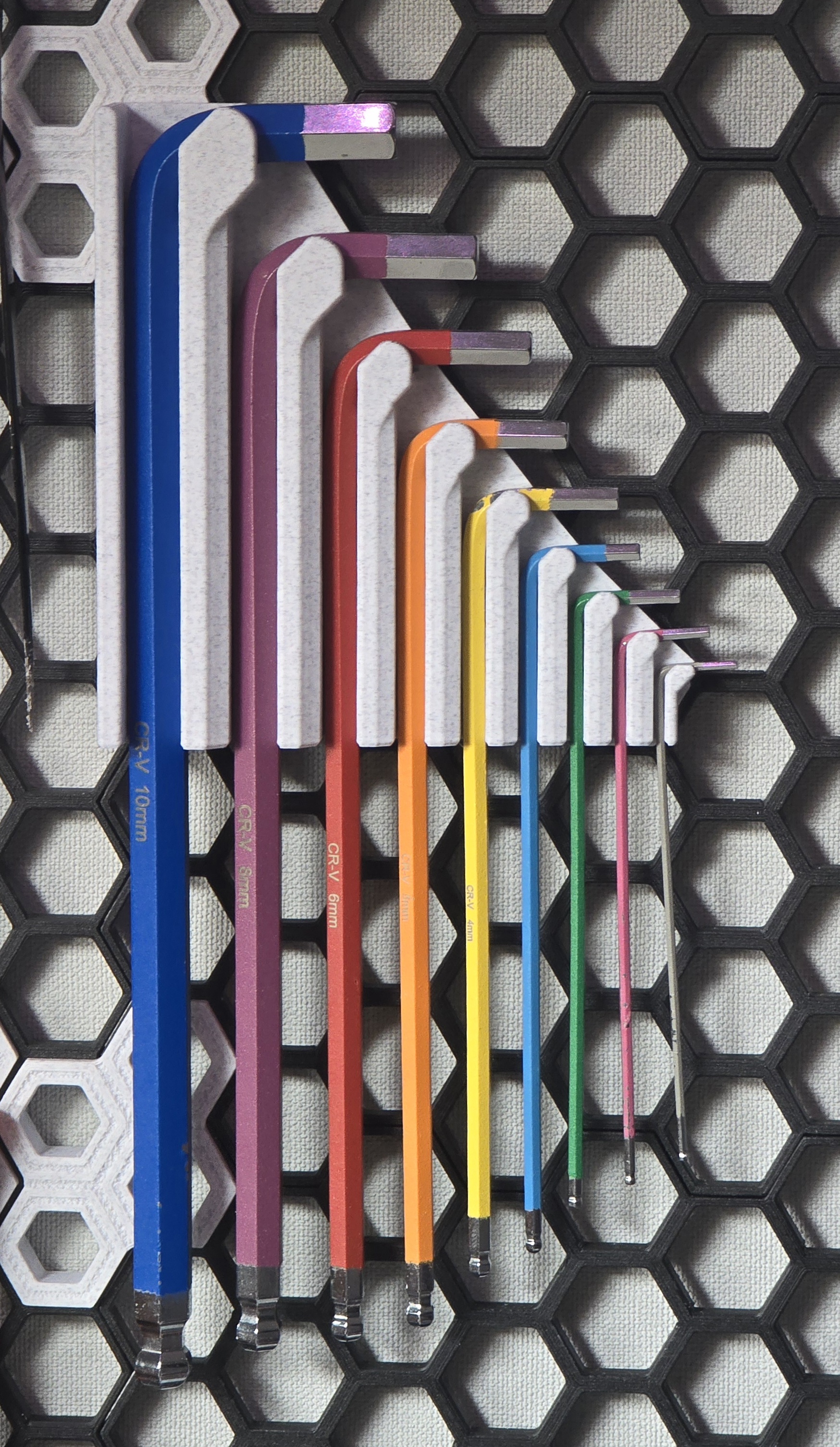 Hex key holder for honeycomb storage wall (HWS)