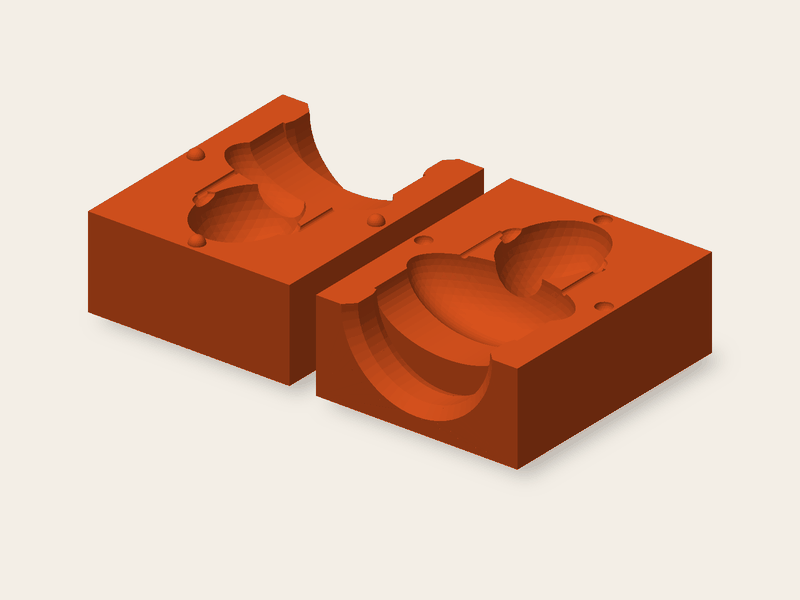 A printed mold of two parts with ball keys, a pouring opening and vents in the parting plane