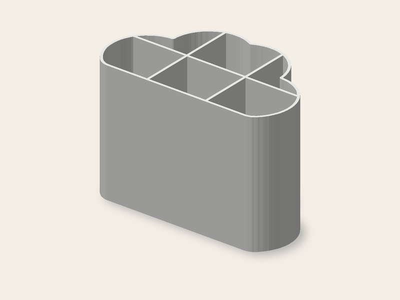 Organizador con forma de nube, 120 × 69 mm y 80 mm de alto, seis compartimentos.